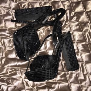 Black Rhinestone platform sandals.
